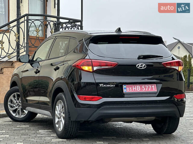 Черный Хендай Туксон, объемом двигателя 2 л и пробегом 156 тыс. км за 12800 $, фото 21 на Automoto.ua
