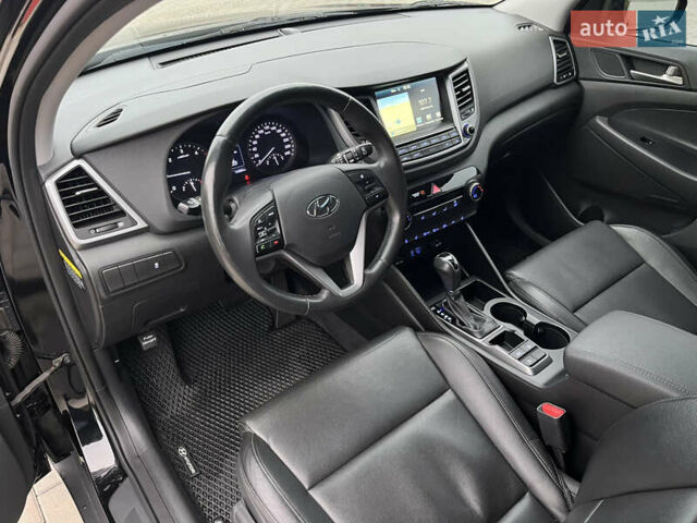 Черный Хендай Туксон, объемом двигателя 1.69 л и пробегом 134 тыс. км за 21800 $, фото 18 на Automoto.ua