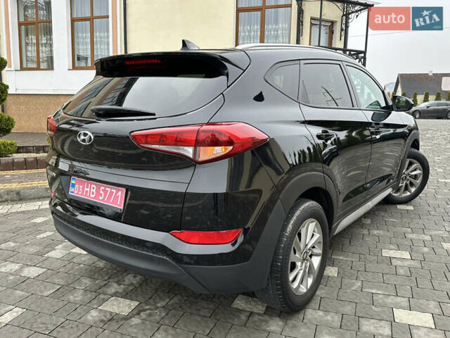 Черный Хендай Туксон, объемом двигателя 2 л и пробегом 156 тыс. км за 12800 $, фото 53 на Automoto.ua