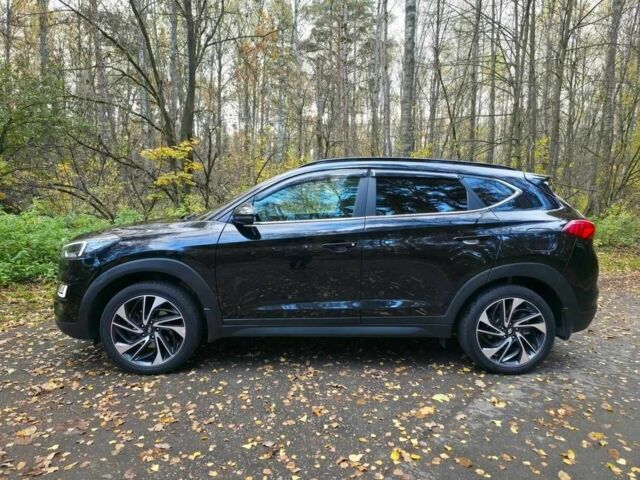 Чорний Хендай Туксон, об'ємом двигуна 2 л та пробігом 135 тис. км за 13500 $, фото 7 на Automoto.ua