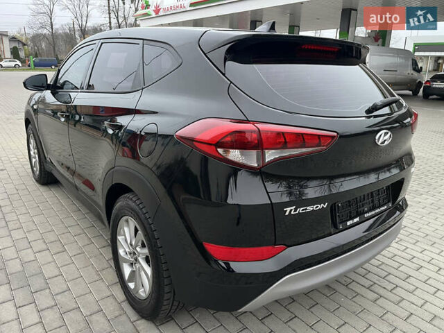Черный Хендай Туксон, объемом двигателя 1.69 л и пробегом 134 тыс. км за 21800 $, фото 12 на Automoto.ua