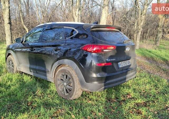 Черный Хендай Туксон, объемом двигателя 2 л и пробегом 101 тыс. км за 19700 $, фото 3 на Automoto.ua