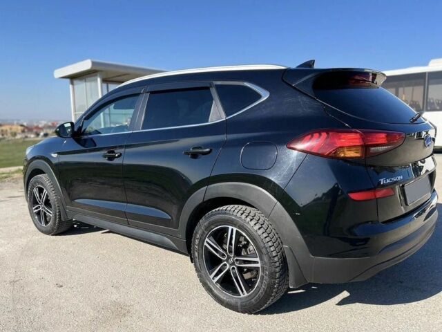 Черный Хендай Туксон, объемом двигателя 2 л и пробегом 108 тыс. км за 10000 $, фото 4 на Automoto.ua