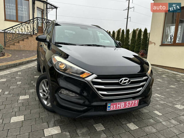 Черный Хендай Туксон, объемом двигателя 2 л и пробегом 156 тыс. км за 12800 $, фото 45 на Automoto.ua