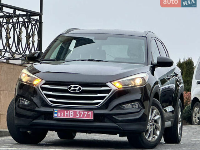 Черный Хендай Туксон, объемом двигателя 2 л и пробегом 156 тыс. км за 12800 $, фото 4 на Automoto.ua