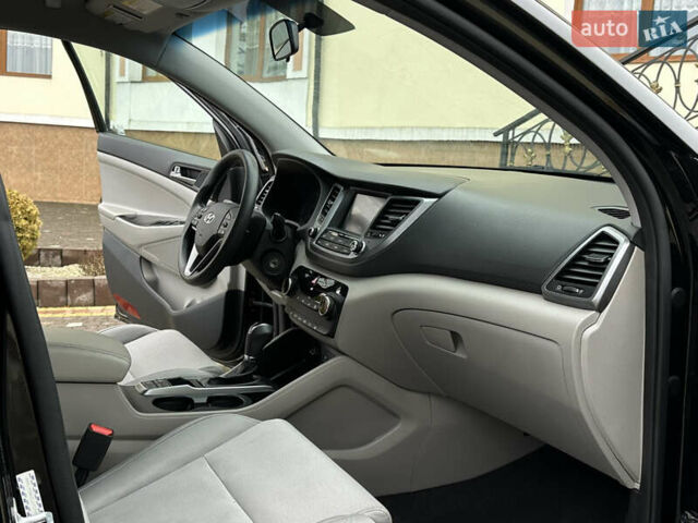 Черный Хендай Туксон, объемом двигателя 2 л и пробегом 156 тыс. км за 12800 $, фото 69 на Automoto.ua
