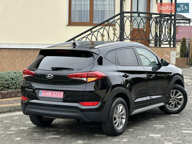 Черный Хендай Туксон, объемом двигателя 2 л и пробегом 156 тыс. км за 12800 $, фото 51 на Automoto.ua