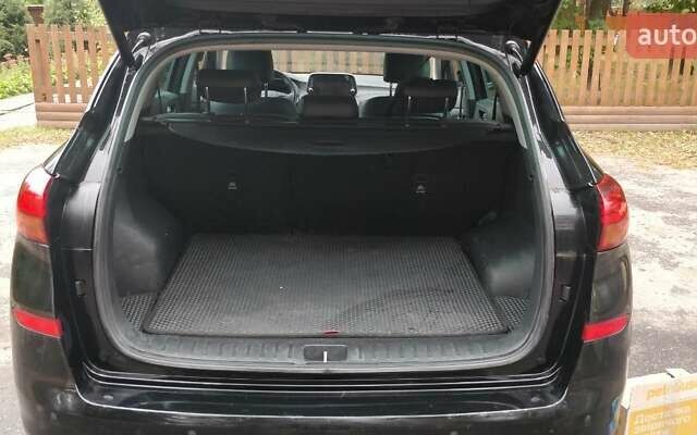 Чорний Хендай Туксон, об'ємом двигуна 2 л та пробігом 91 тис. км за 25000 $, фото 3 на Automoto.ua