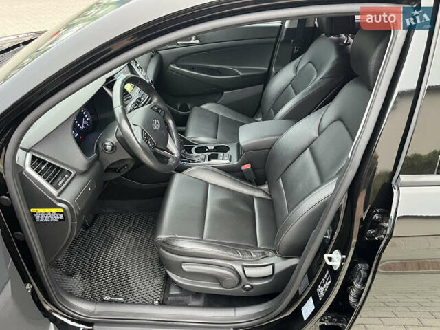 Черный Хендай Туксон, объемом двигателя 1.69 л и пробегом 134 тыс. км за 21800 $, фото 19 на Automoto.ua