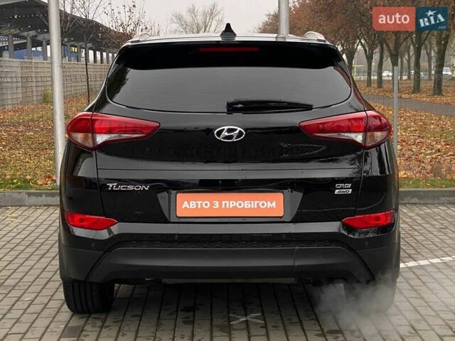 Черный Хендай Туксон, объемом двигателя 2 л и пробегом 106 тыс. км за 19500 $, фото 6 на Automoto.ua