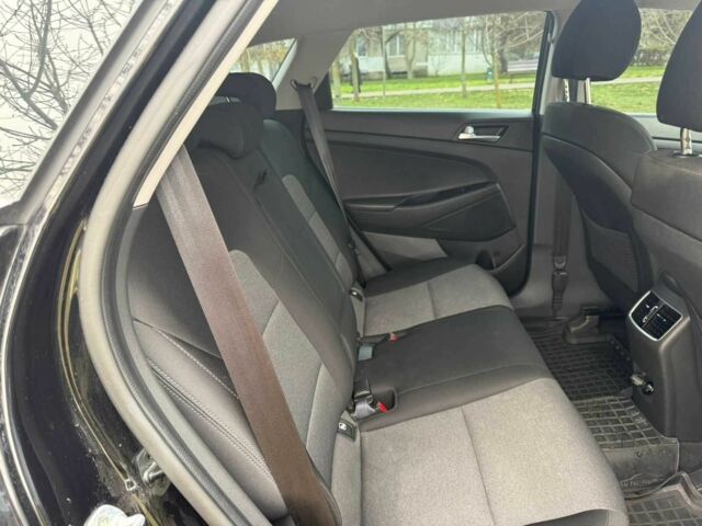 Чорний Хендай Туксон, об'ємом двигуна 2 л та пробігом 70 тис. км за 23000 $, фото 3 на Automoto.ua