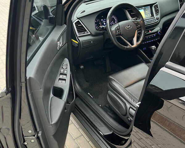 Черный Хендай Туксон, объемом двигателя 1.69 л и пробегом 134 тыс. км за 21800 $, фото 17 на Automoto.ua