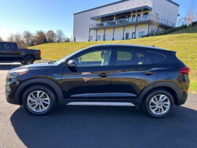 Чорний Хендай Туксон, об'ємом двигуна 2 л та пробігом 48 тис. км за 10800 $, фото 3 на Automoto.ua