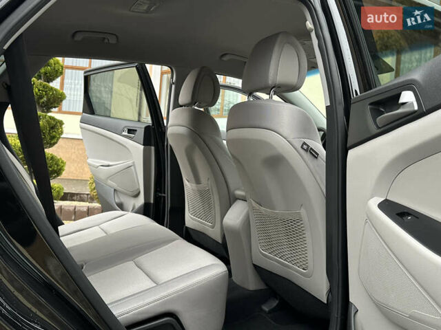 Черный Хендай Туксон, объемом двигателя 2 л и пробегом 156 тыс. км за 12800 $, фото 80 на Automoto.ua