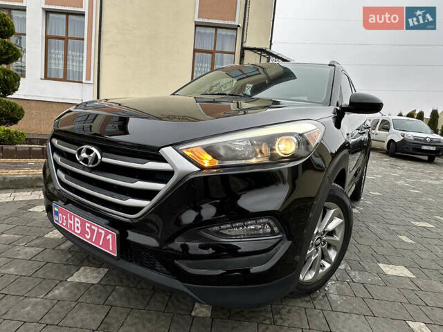 Черный Хендай Туксон, объемом двигателя 2 л и пробегом 156 тыс. км за 12800 $, фото 14 на Automoto.ua