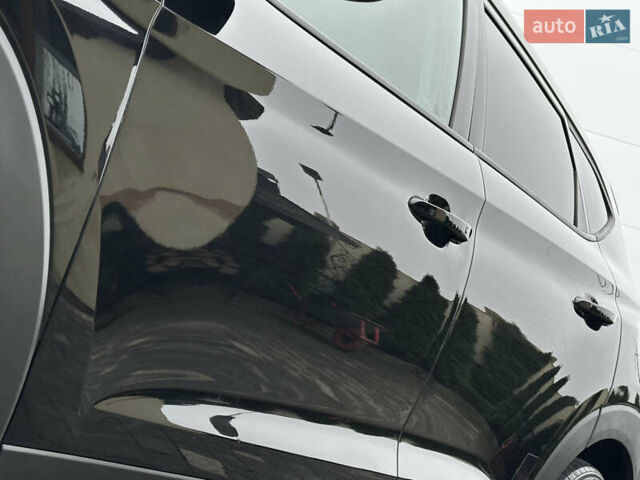 Черный Хендай Туксон, объемом двигателя 2 л и пробегом 156 тыс. км за 12800 $, фото 12 на Automoto.ua