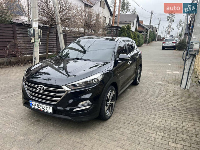 Черный Хендай Туксон, объемом двигателя 2 л и пробегом 94 тыс. км за 24000 $, фото 15 на Automoto.ua