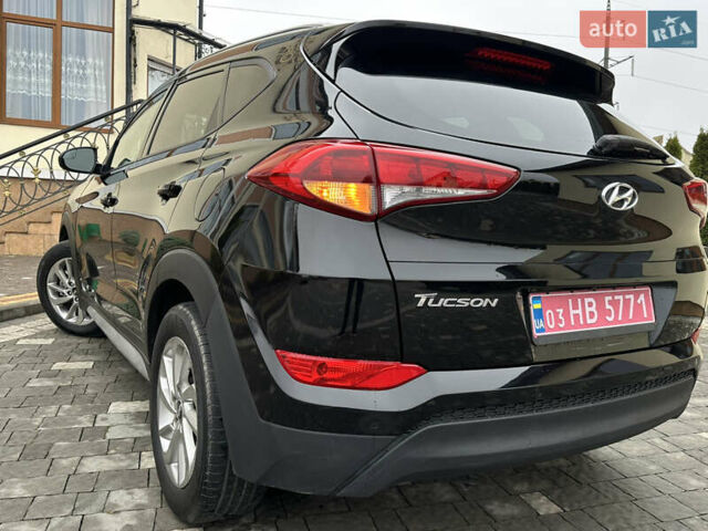 Черный Хендай Туксон, объемом двигателя 2 л и пробегом 156 тыс. км за 12800 $, фото 32 на Automoto.ua