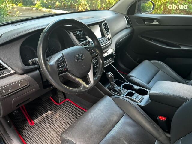 Черный Хендай Туксон, объемом двигателя 2 л и пробегом 109 тыс. км за 18490 $, фото 11 на Automoto.ua
