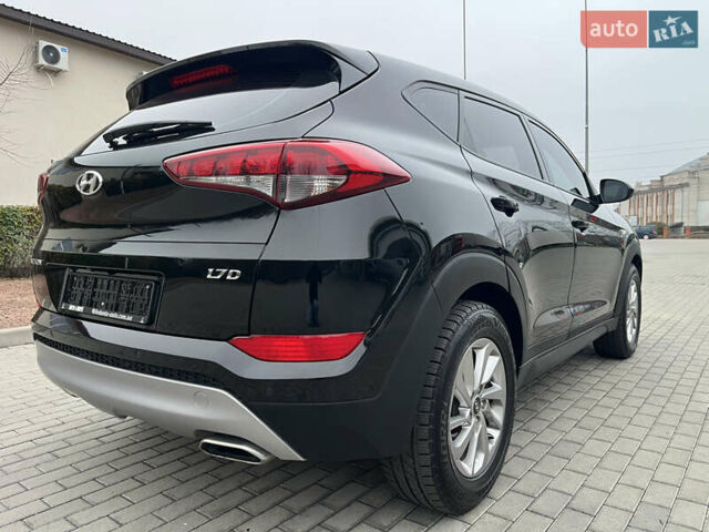 Черный Хендай Туксон, объемом двигателя 1.69 л и пробегом 134 тыс. км за 21800 $, фото 14 на Automoto.ua