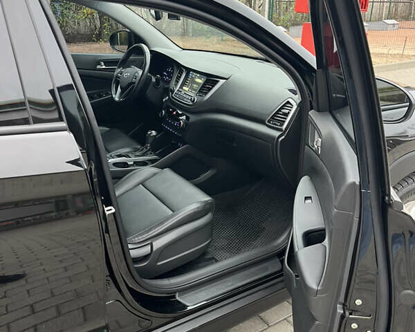 Черный Хендай Туксон, объемом двигателя 1.69 л и пробегом 134 тыс. км за 21800 $, фото 24 на Automoto.ua