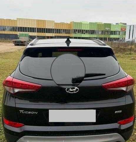 Черный Хендай Туксон, объемом двигателя 1.6 л и пробегом 65 тыс. км за 12600 $, фото 4 на Automoto.ua