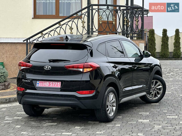 Черный Хендай Туксон, объемом двигателя 2 л и пробегом 156 тыс. км за 12800 $, фото 61 на Automoto.ua