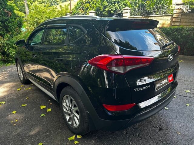 Черный Хендай Туксон, объемом двигателя 2 л и пробегом 109 тыс. км за 18490 $, фото 6 на Automoto.ua