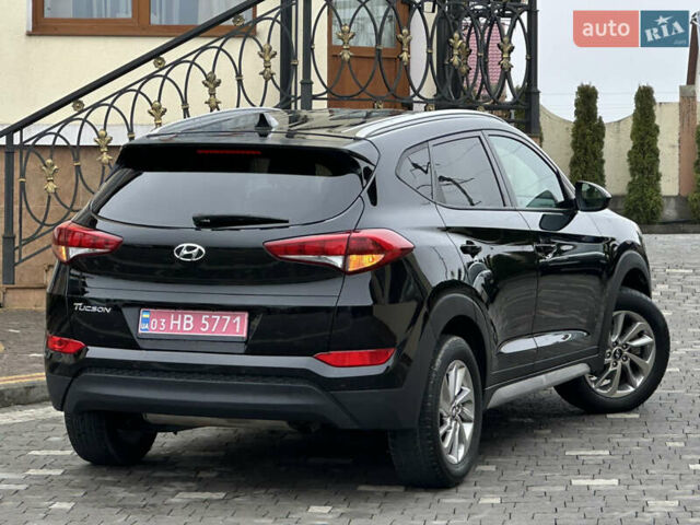 Черный Хендай Туксон, объемом двигателя 2 л и пробегом 156 тыс. км за 12800 $, фото 50 на Automoto.ua
