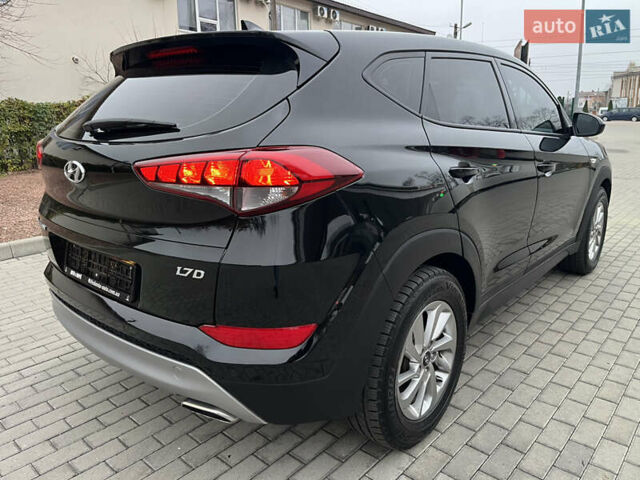 Черный Хендай Туксон, объемом двигателя 1.69 л и пробегом 134 тыс. км за 21800 $, фото 11 на Automoto.ua