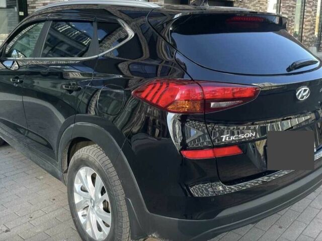 Черный Хендай Туксон, объемом двигателя 2 л и пробегом 119 тыс. км за 9900 $, фото 4 на Automoto.ua