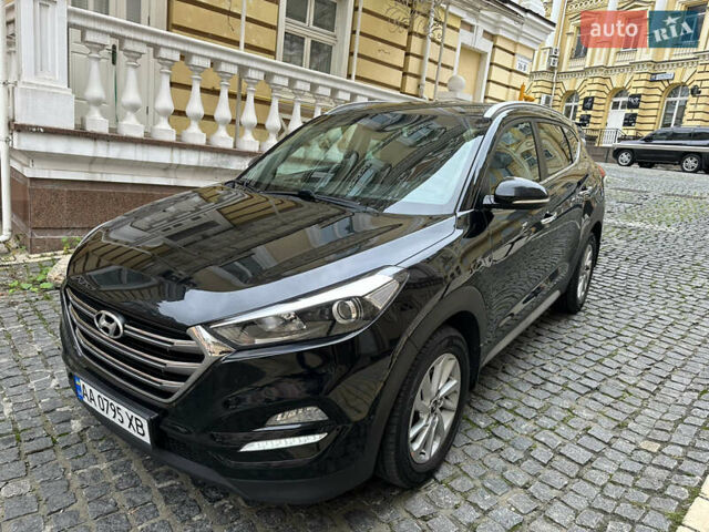 Черный Хендай Туксон, объемом двигателя 2 л и пробегом 100 тыс. км за 16900 $, фото 16 на Automoto.ua