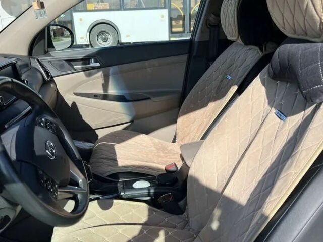 Черный Хендай Туксон, объемом двигателя 2 л и пробегом 108 тыс. км за 10000 $, фото 7 на Automoto.ua