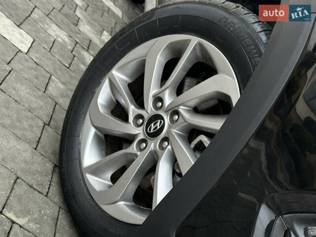 Черный Хендай Туксон, объемом двигателя 2 л и пробегом 156 тыс. км за 12800 $, фото 44 на Automoto.ua