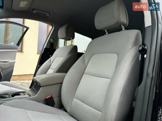 Черный Хендай Туксон, объемом двигателя 2 л и пробегом 156 тыс. км за 12800 $, фото 67 на Automoto.ua