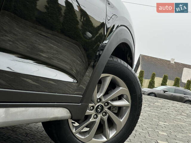 Черный Хендай Туксон, объемом двигателя 2 л и пробегом 156 тыс. км за 12800 $, фото 54 на Automoto.ua