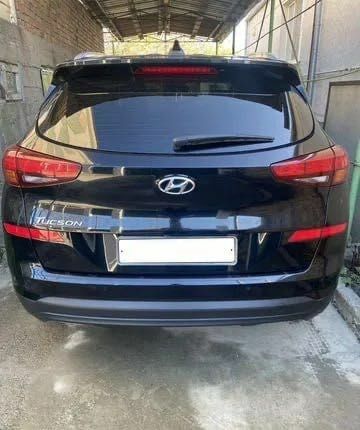 Черный Хендай Туксон, объемом двигателя 2 л и пробегом 108 тыс. км за 10000 $, фото 1 на Automoto.ua