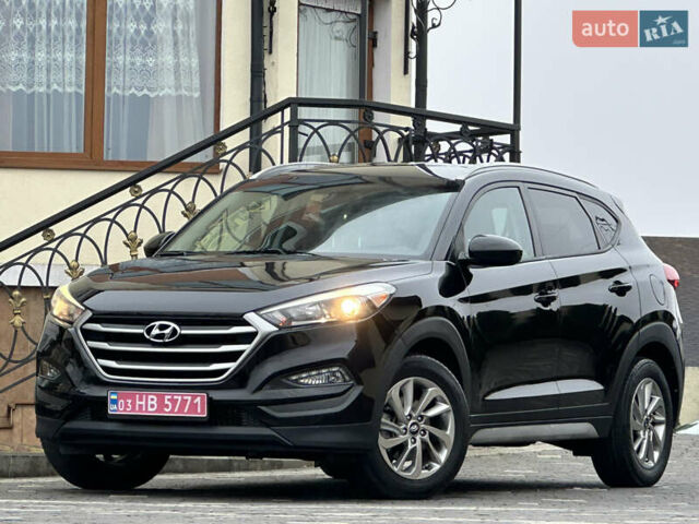 Черный Хендай Туксон, объемом двигателя 2 л и пробегом 156 тыс. км за 12800 $, фото 3 на Automoto.ua