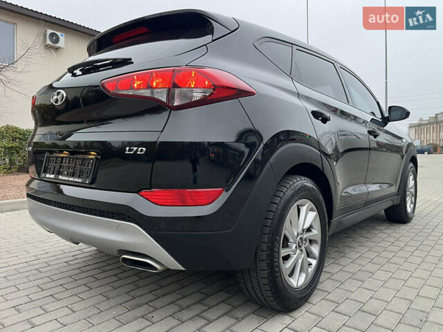 Черный Хендай Туксон, объемом двигателя 1.69 л и пробегом 134 тыс. км за 21800 $, фото 10 на Automoto.ua