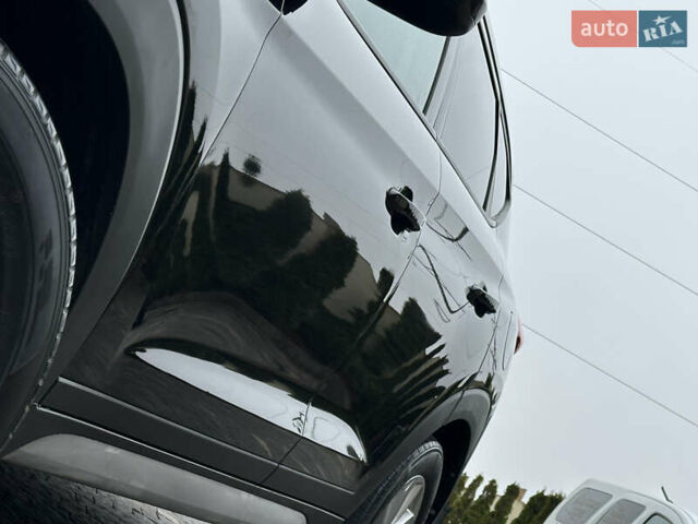 Черный Хендай Туксон, объемом двигателя 2 л и пробегом 156 тыс. км за 12800 $, фото 13 на Automoto.ua