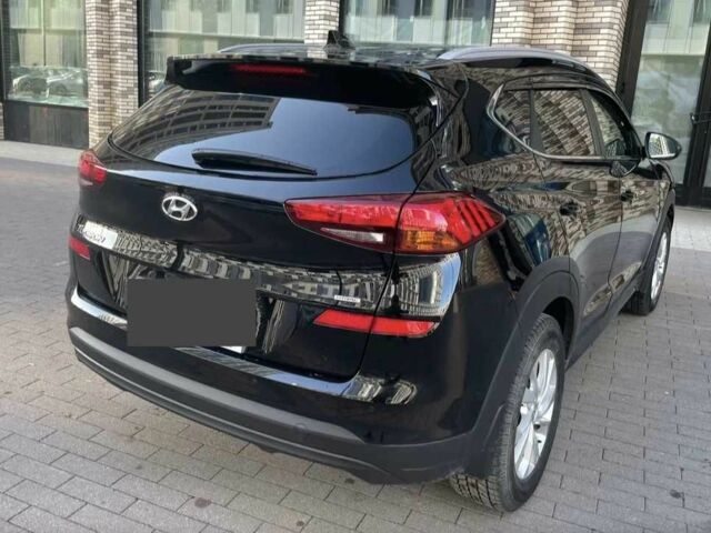 Черный Хендай Туксон, объемом двигателя 2 л и пробегом 119 тыс. км за 9900 $, фото 1 на Automoto.ua