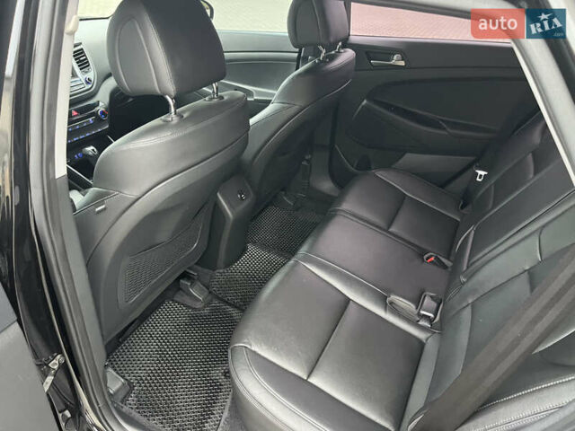 Черный Хендай Туксон, объемом двигателя 1.69 л и пробегом 134 тыс. км за 21800 $, фото 23 на Automoto.ua