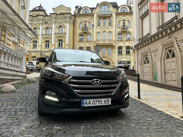 Черный Хендай Туксон, объемом двигателя 2 л и пробегом 100 тыс. км за 16900 $, фото 13 на Automoto.ua