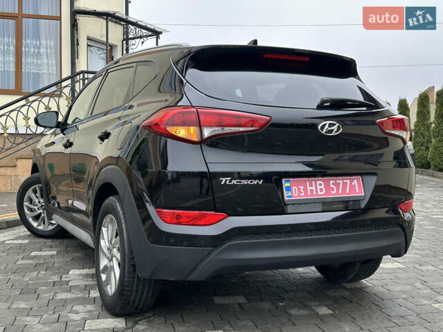 Черный Хендай Туксон, объемом двигателя 2 л и пробегом 156 тыс. км за 12800 $, фото 23 на Automoto.ua