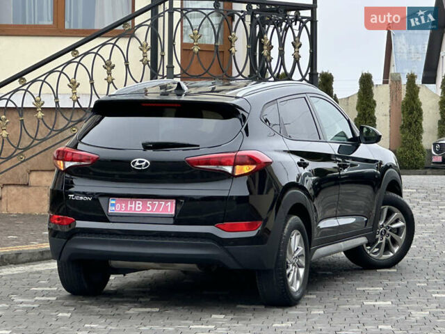 Черный Хендай Туксон, объемом двигателя 2 л и пробегом 156 тыс. км за 12800 $, фото 63 на Automoto.ua