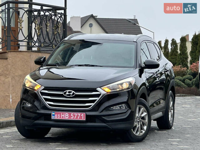 Черный Хендай Туксон, объемом двигателя 2 л и пробегом 156 тыс. км за 12800 $, фото 2 на Automoto.ua