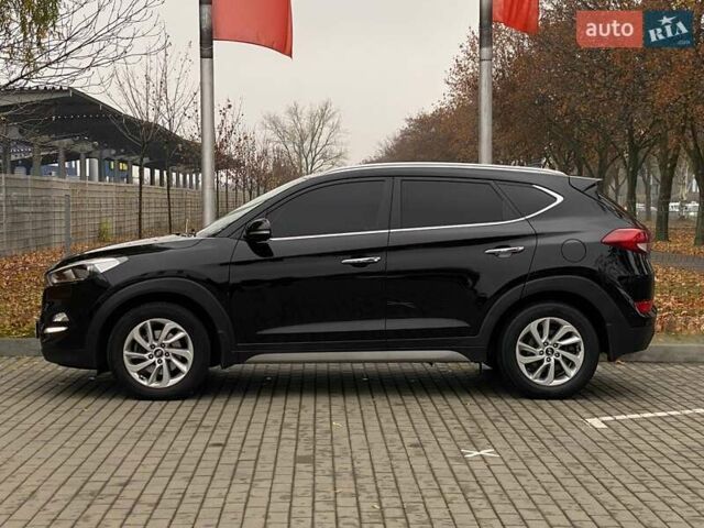 Черный Хендай Туксон, объемом двигателя 2 л и пробегом 106 тыс. км за 19500 $, фото 4 на Automoto.ua