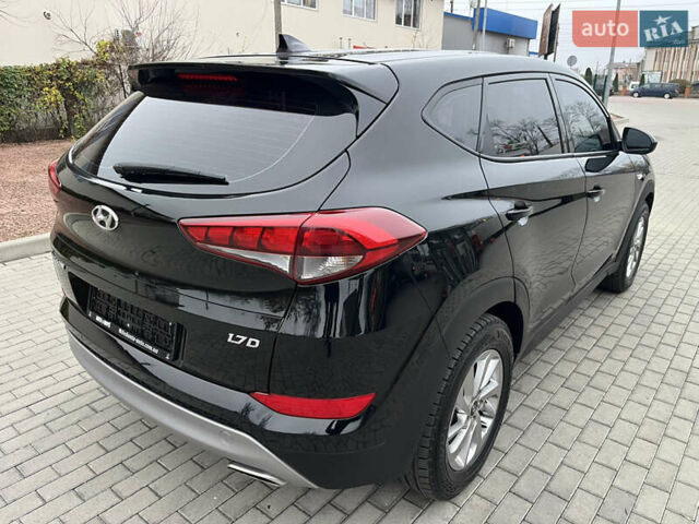 Черный Хендай Туксон, объемом двигателя 1.69 л и пробегом 134 тыс. км за 21800 $, фото 15 на Automoto.ua
