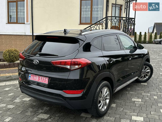 Черный Хендай Туксон, объемом двигателя 2 л и пробегом 156 тыс. км за 12800 $, фото 52 на Automoto.ua