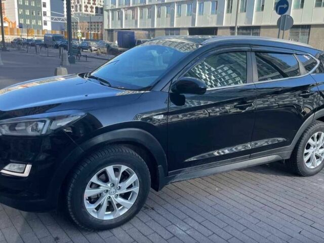 Черный Хендай Туксон, объемом двигателя 2 л и пробегом 119 тыс. км за 9900 $, фото 3 на Automoto.ua